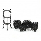 FOUR CAST IRON JARDINIERES AND