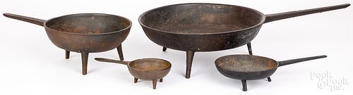 FOUR CAST IRON POSNETS AND