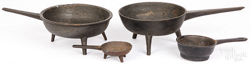 FOUR CAST IRON POSNETS AND