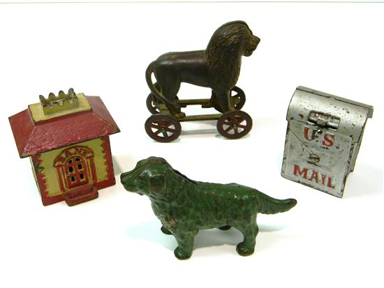 Four cast iron still banks: