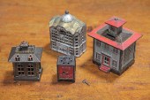 FOUR CAST IRON STILL BANKS.  A