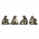 FOUR CAST STONE GARDEN STATUES