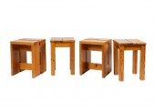 FOUR CHARLOTTE PERRIAND STOOLS