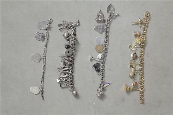 FOUR CHARM BRACELETS. One cowboy 