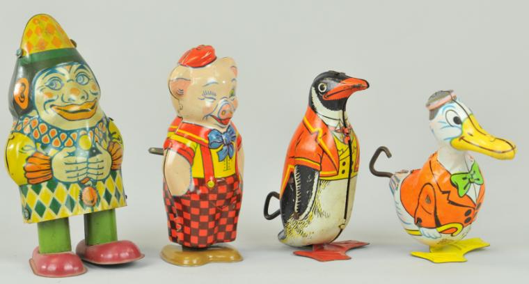 FOUR CHEIN WIND-UP TOYS All