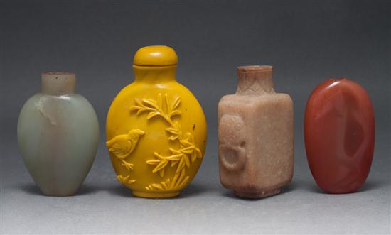 Four Chinese carved hardstone snuff