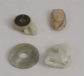 FOUR CHINESE CARVED JADE ARTIC