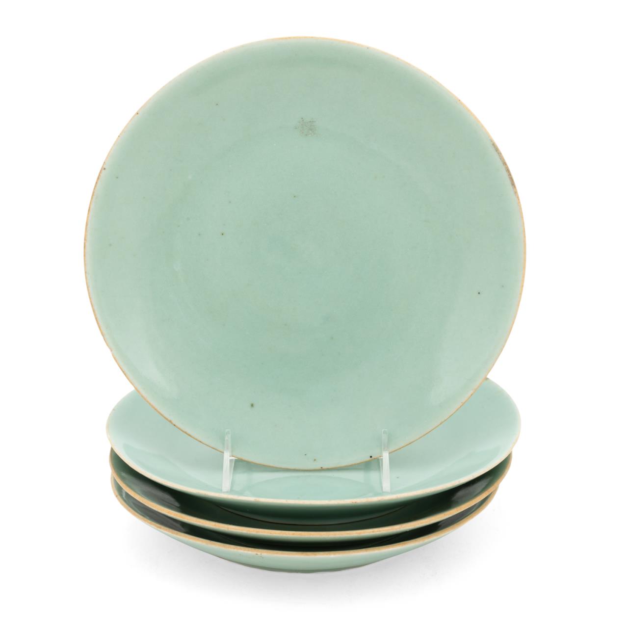 FOUR CHINESE CELADON LOW BOWLS Four