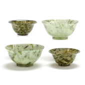 FOUR CHINESE JADE TEA BOWLS<br