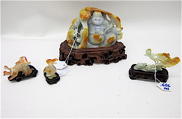 FOUR CHINESE SCULPTED JADES: the