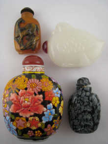 Four Chinese snuff bottles one with