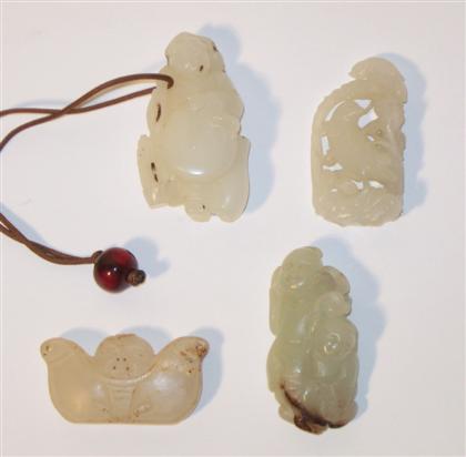 Four Chinese white jade pendants