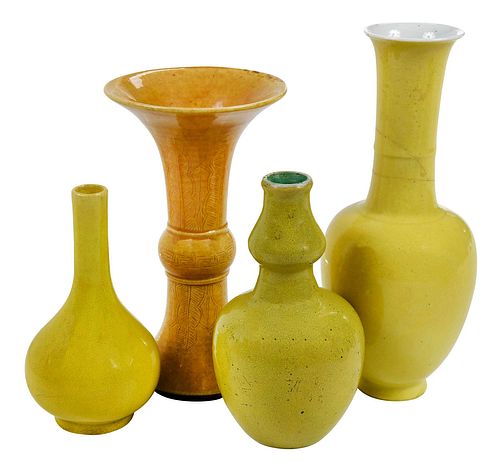 FOUR CHINESE YELLOW GLAZED