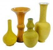 FOUR CHINESE YELLOW GLAZED POR