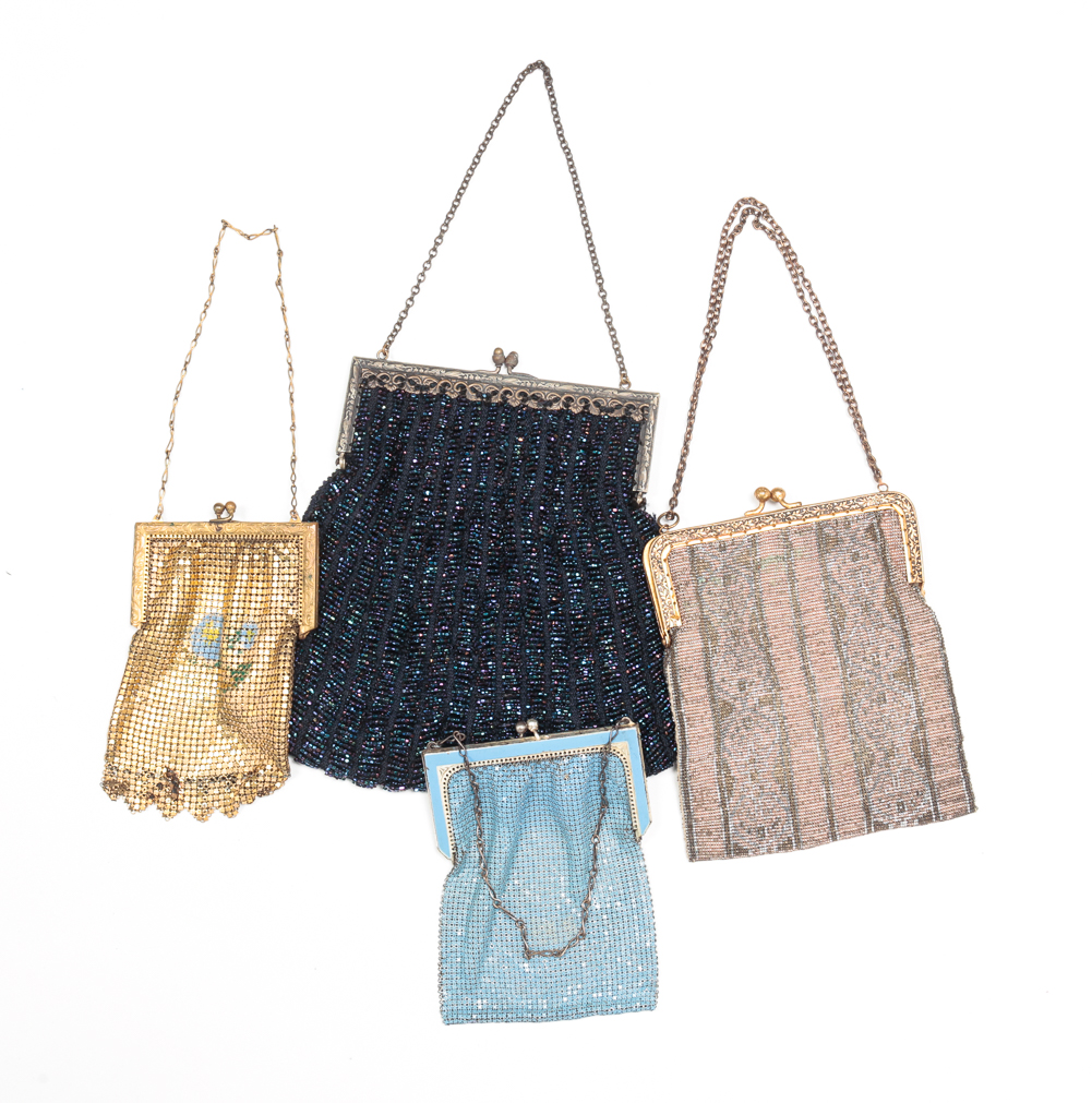 FOUR CLASP CLOSURE PURSES. First