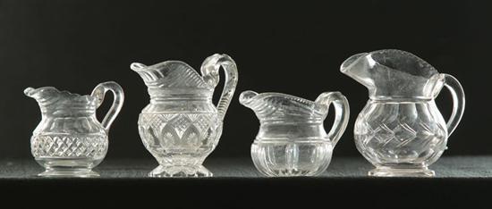 FOUR CLEAR CUT CREAMERS.  American