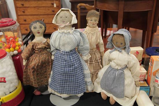 FOUR CLOTH DOLLS. Oil painted