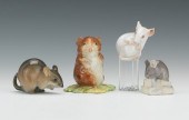 Four Collectable Porcelain Fig