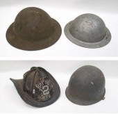 FOUR COLLECTIBLE HELMETS: THE
