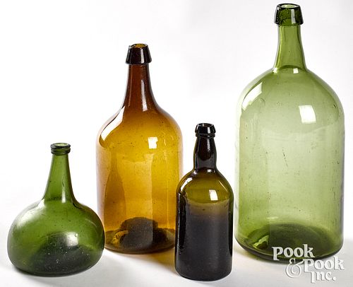 FOUR COLORED GLASS BOTTLES,