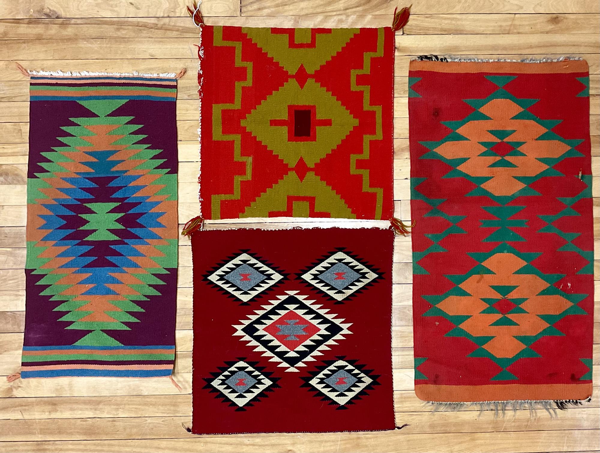 FOUR COLORFUL NAVAJO SAMPLERS.