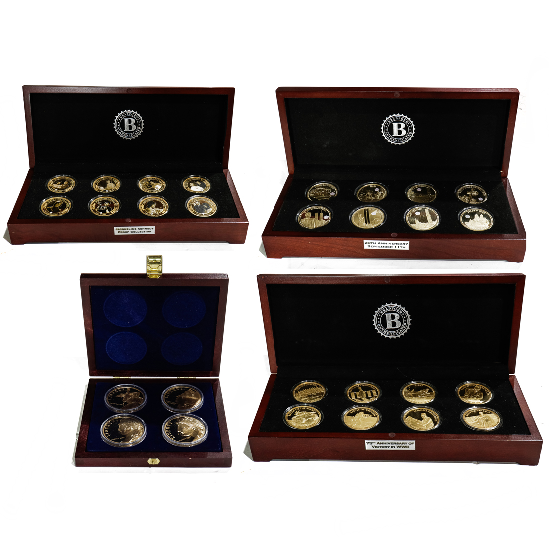 FOUR COMMEMORATIVE PROOF SETS: