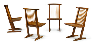 Four conoid walnut dining  chairs