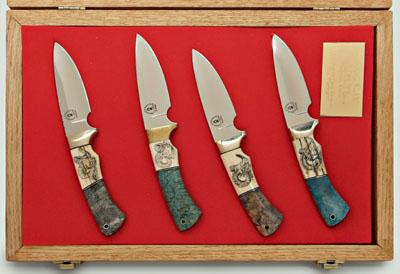Four contemporary hunting knives: