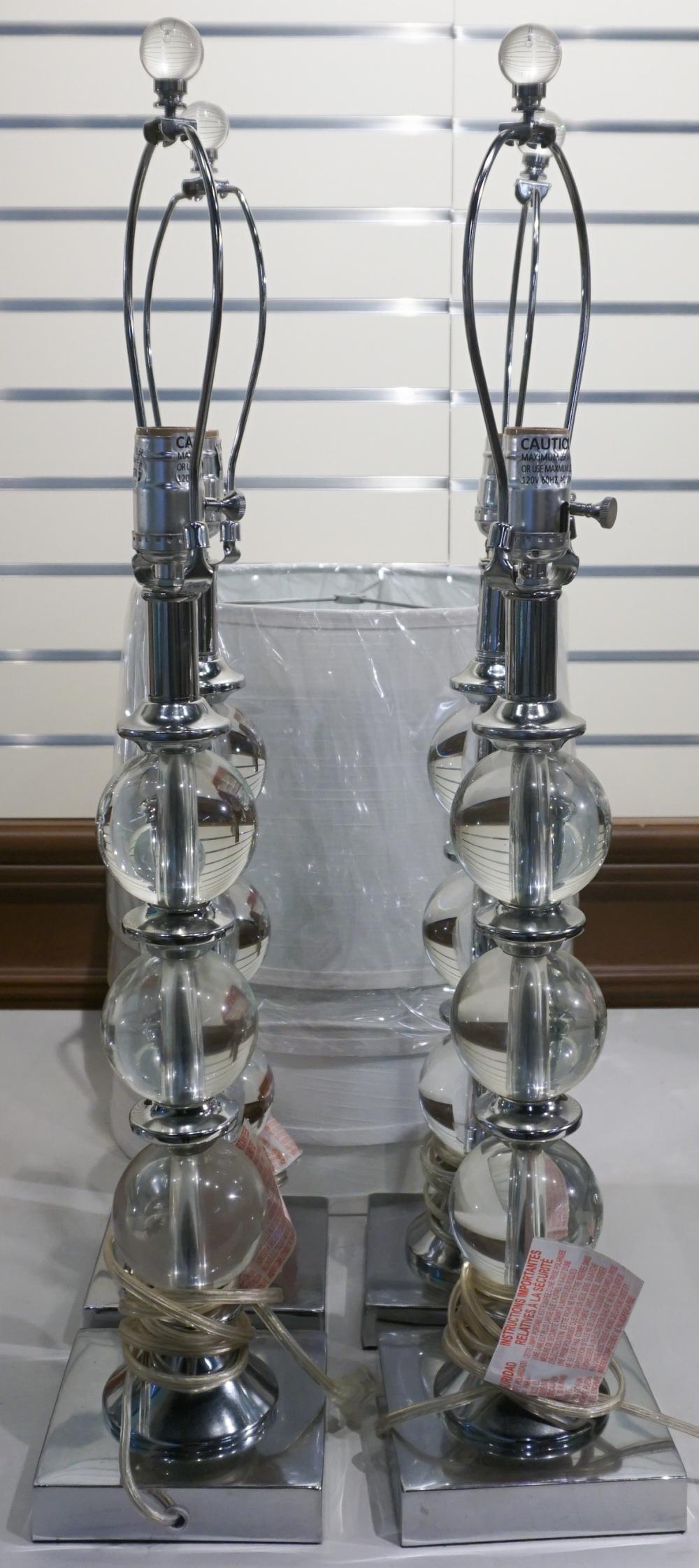 FOUR CONTEMPORARY LUCITE AND CHROME