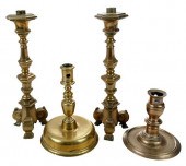 FOUR CONTINENTAL BRASS CANDLES