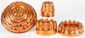 FOUR COPPER FOOD MOLDS, LATE 1