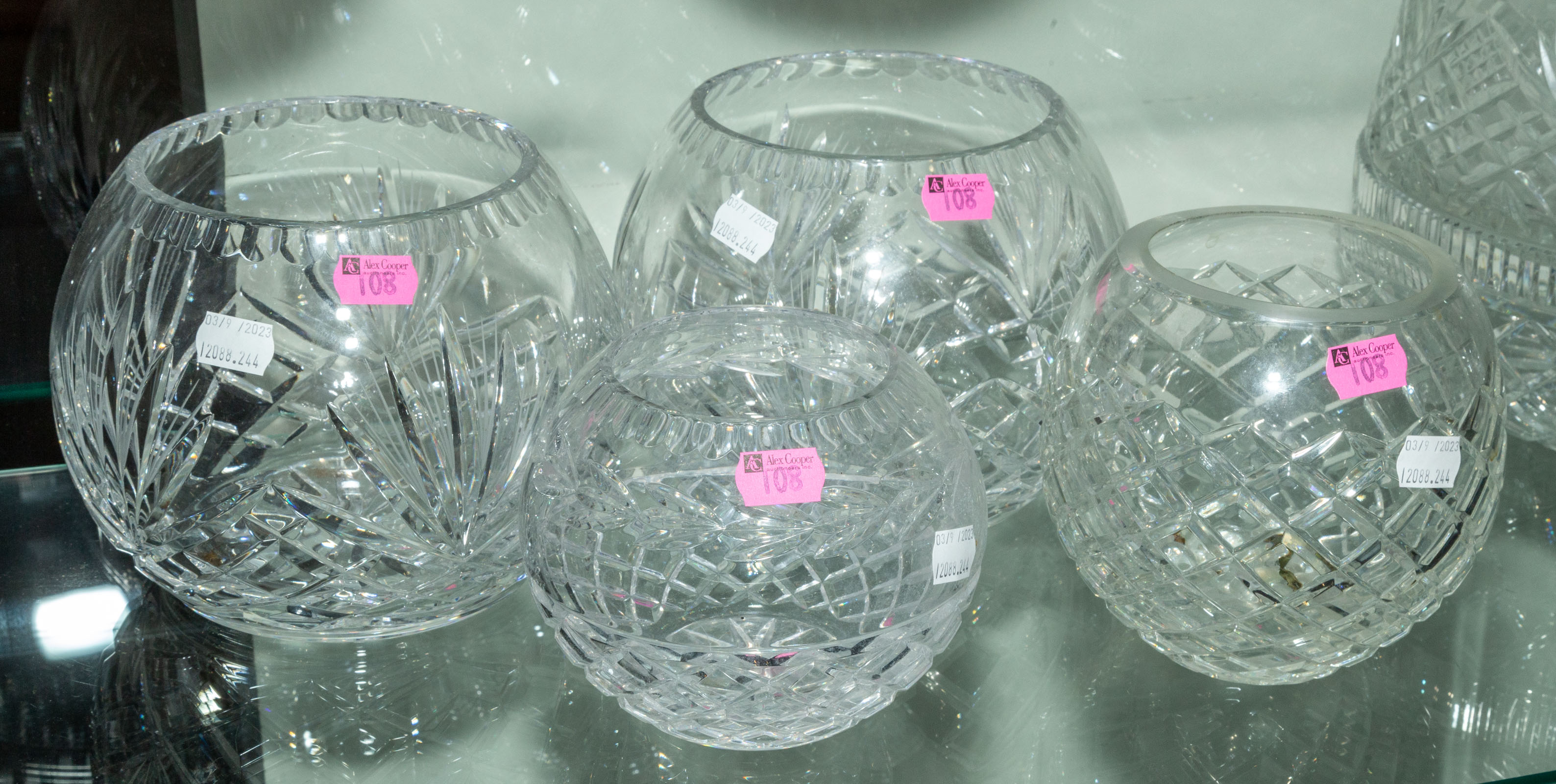 FOUR CRYSTAL ROSE BOWLS Possibly