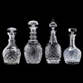 FOUR CUT CRYSTAL DECANTERS, IN