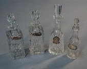 FOUR CUT CRYSTAL DECANTERS WIT