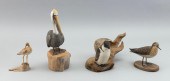 FOUR DECORATIVE BIRD CARVINGS