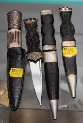 FOUR DECORATIVE SCOTTISH DIRKS