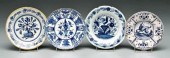 Four Delft shallow bowls: one