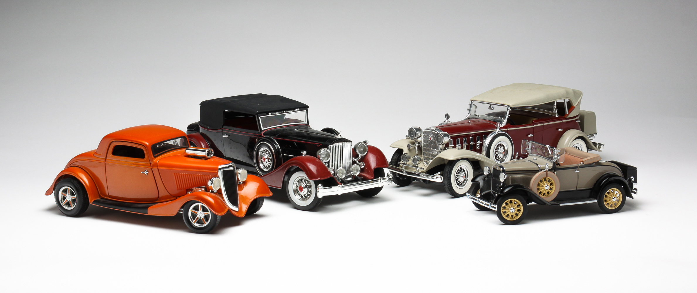 FOUR DIECAST CARS. Late 20th