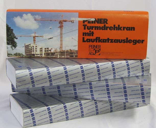 FOUR DIECAST METAL TOWER CRANE KITS