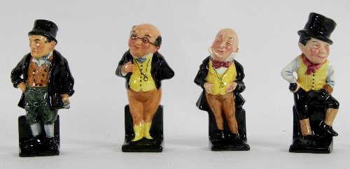 Four Doulton figures characters