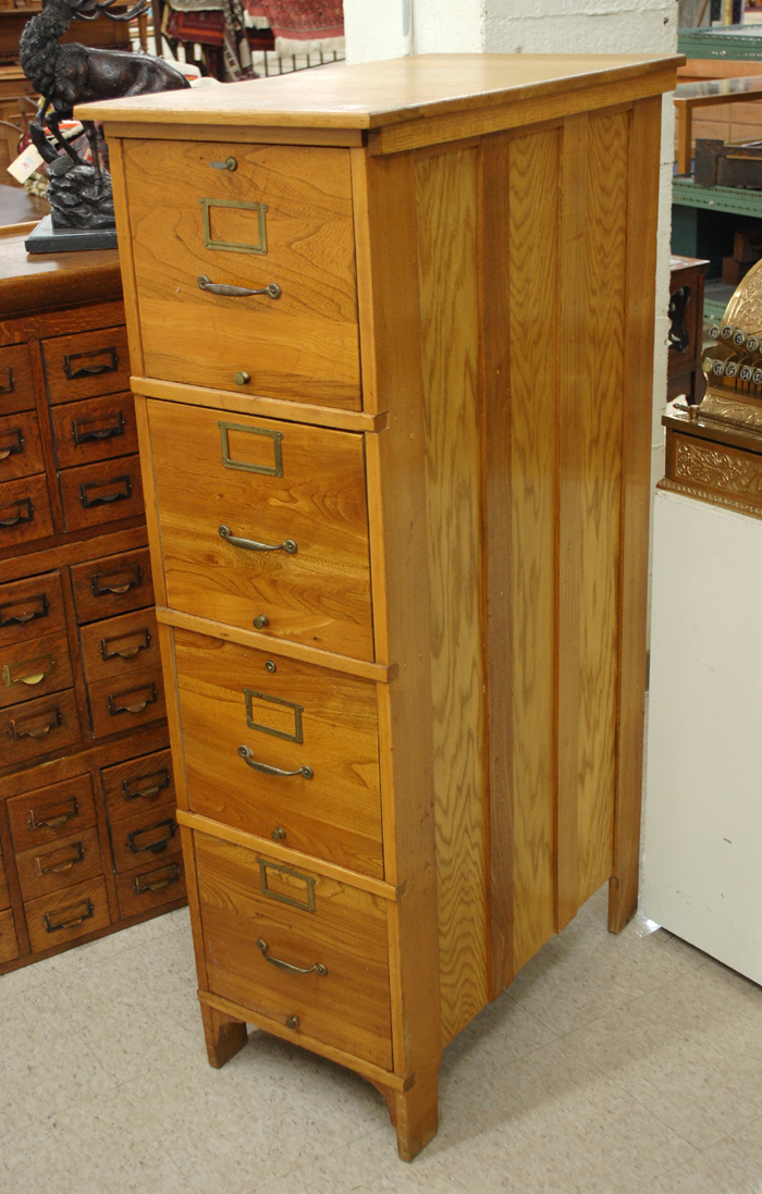 FOUR-DRAWER OAK FILE CABINET