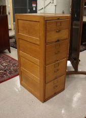 FOUR-DRAWER OAK FILE CABINET,