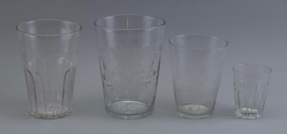 FOUR EARLY COLORLESS FLIP GLASSES