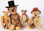 FOUR EARLY STUFFED MOHAIR TEDD