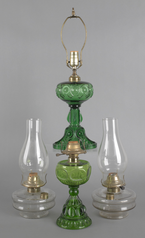Four electrified kerosene lamps two