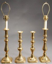 FOUR ENGLISH BRASS CANDLESTICK