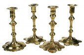 FOUR ENGLISH BRASS PETAL BASE