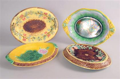 Four English majolica bread plates