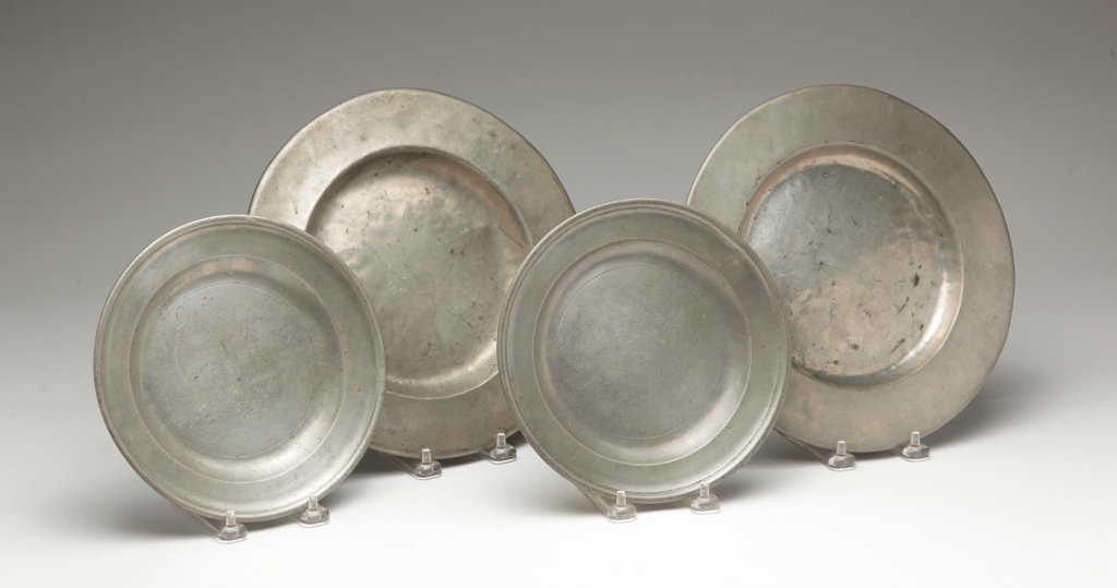 FOUR ENGLISH PEWTER PLATES. First