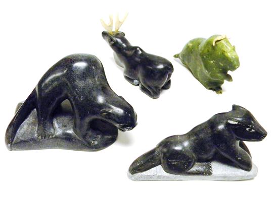 Four ''Eskimo Art Canada'' carved